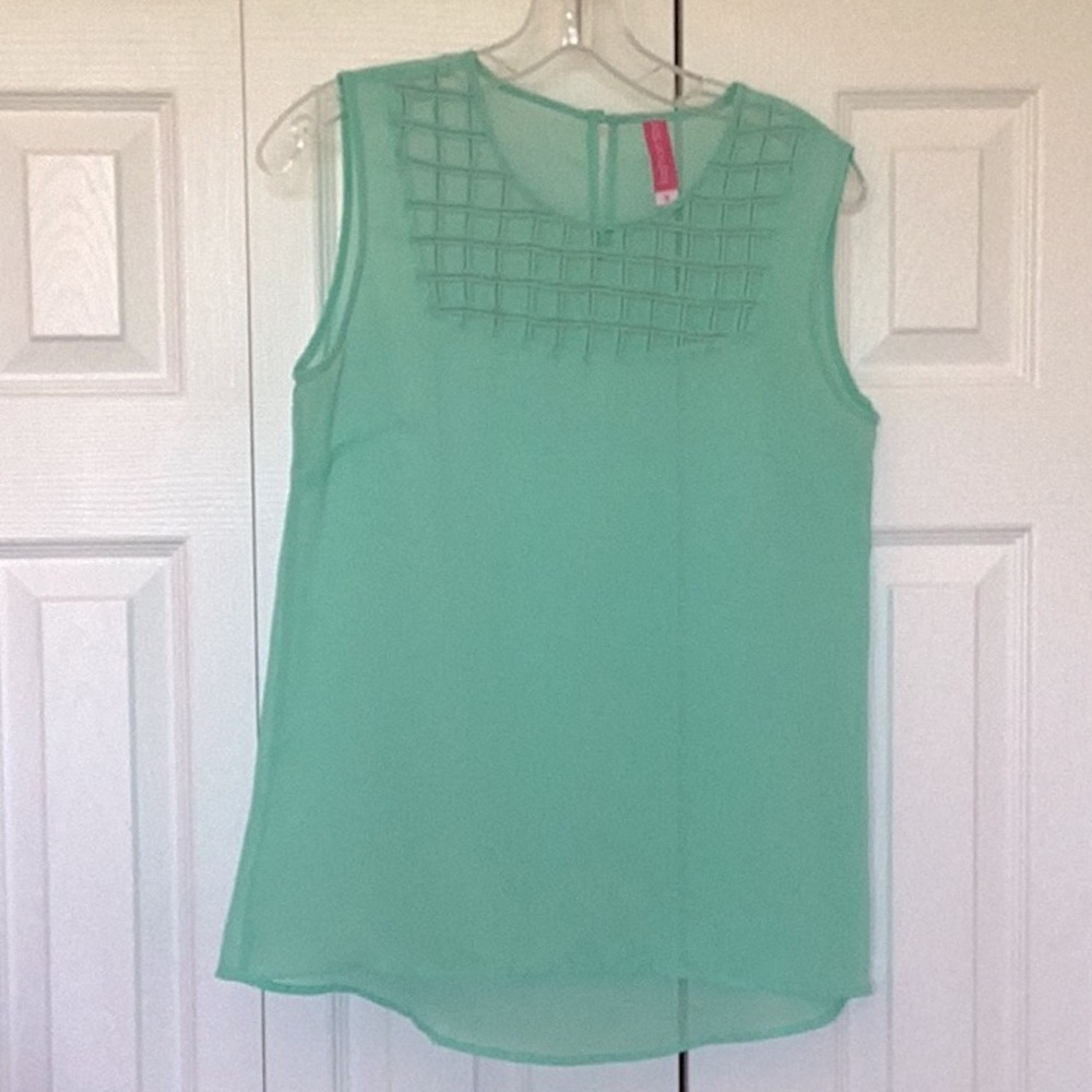 Sleeveless shirt by Fashion Spy